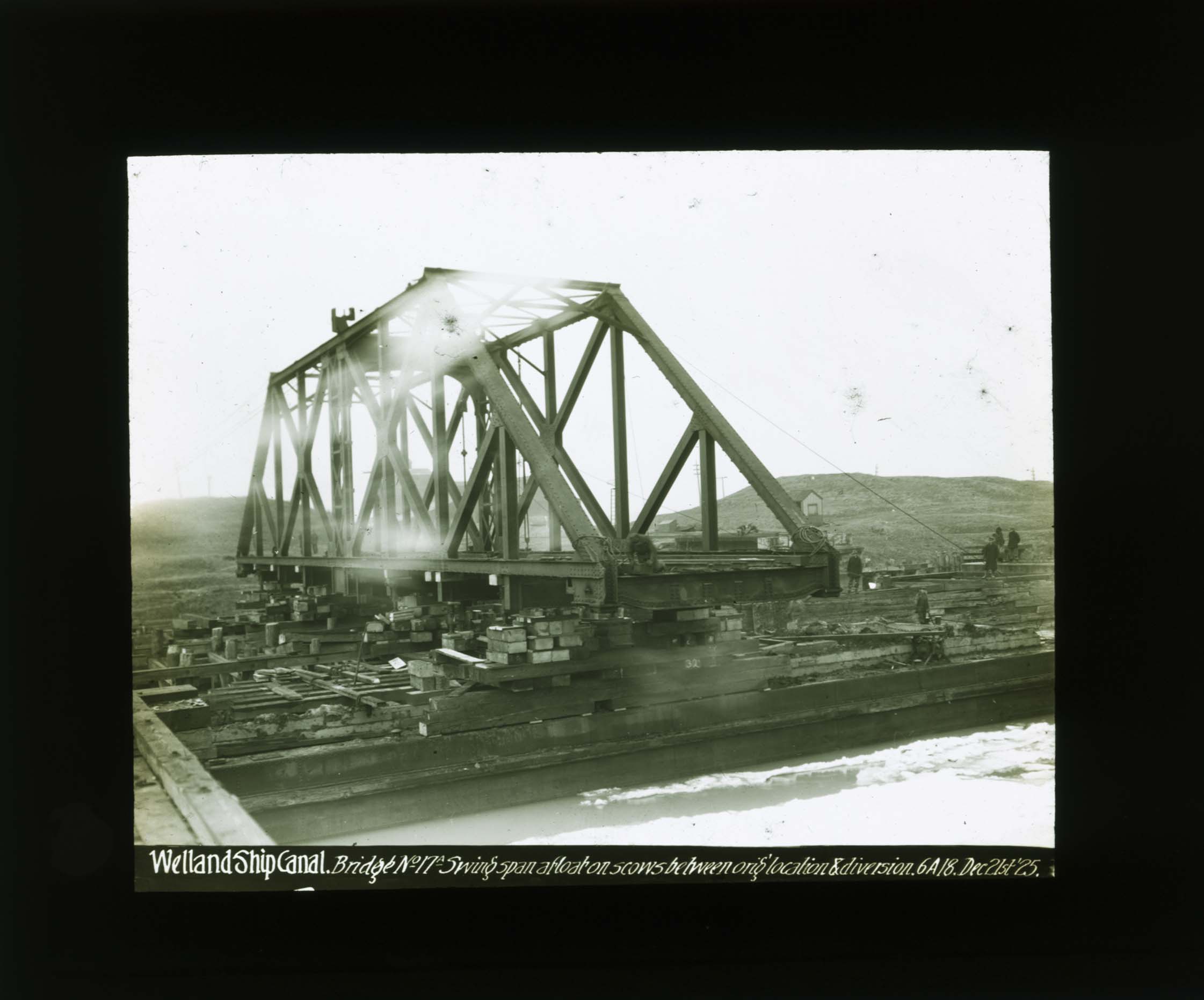 Bridge no. 17A swing span afloat on scows between original location and diversion